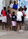 Children helping with MDF