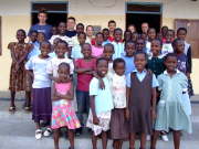 The team with some of the children